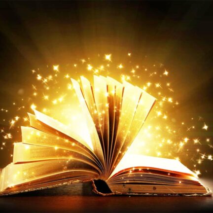 Opened magic book with magic light. Education